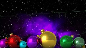 Flashing yellow christmas string lights and coloured baubles, falling snow and purple cloud on black. Christmas, decorations, tradition and celebration digitally generated video. - Powered by Shutterstock - Get 15% off with code: PIKWIZARD15