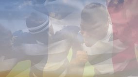 Animation of waving france flag against team of diverse male rugby players discussing in a huddle. Sports, fitness and patriotism concept - Powered by Shutterstock - Get 15% off with code: PIKWIZARD15