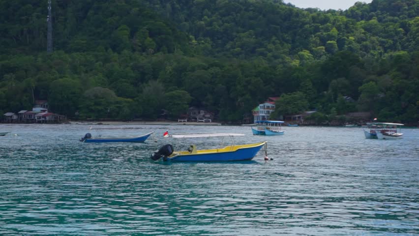 Tour boat for tourist and divers. Landscape of Weh island and Rubiah island. Beautiful landcape of Sabang Island in Sumatera Indonesia.