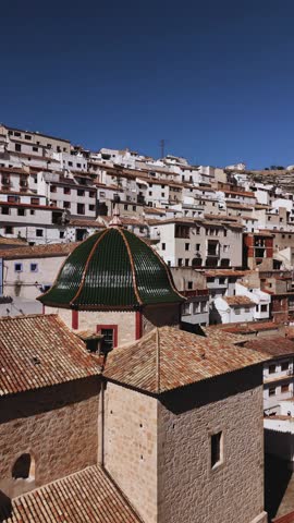 Aerial view of Alcala del Jucar, Spain. Drone vertical video. Old town city view