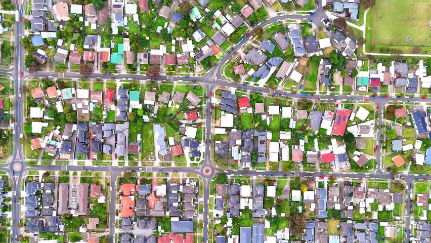 Panoramic aerial drone view of Northern Melbourne Suburbs with Houses roads and parks in Melbourne Victoria Australia