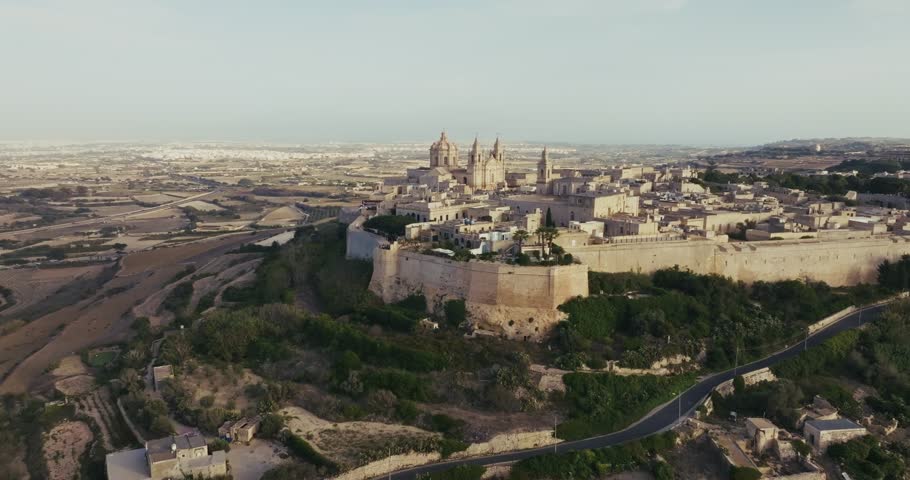 Aerial Perspective of the Cityscape in Mdina Malta Featuring Historical Architecture and Touristic Landmarks on a Mediterranean Island. High quality 4k footage