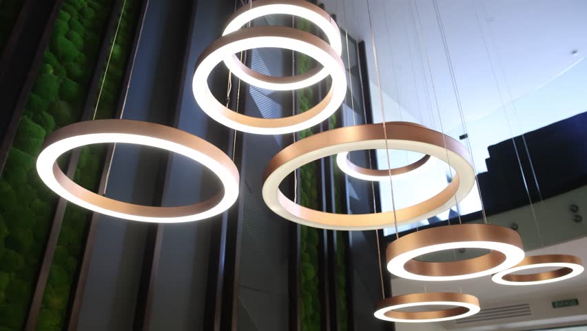round modern chandelier in the lobby of the hotel