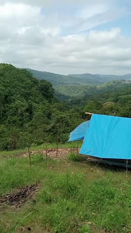 simple camping in the middle of the mountain.