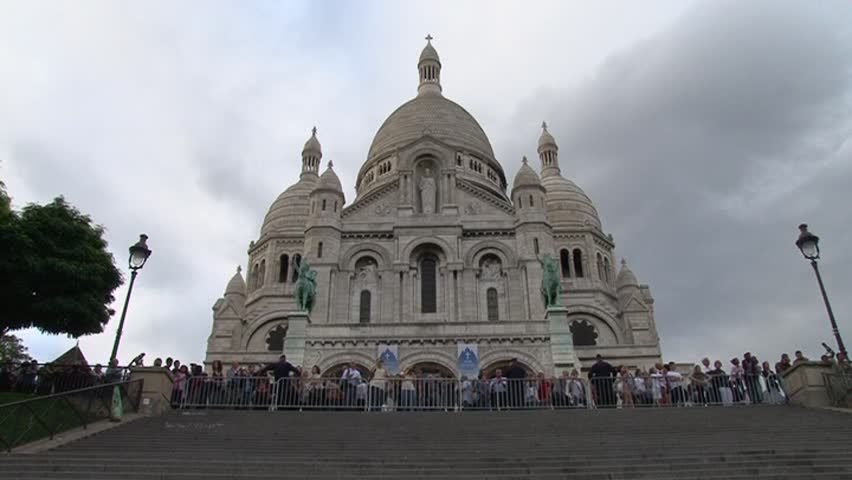 Basilique du Sacre-Coeur (Basilica of the Sacred Heart) in Montmartre, Paris. Romano-Byzantine style landmark built of travertine stone. 