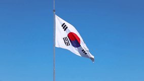 South Korean flag waving on the wind against blue sky - Powered by Shutterstock - Get 15% off with code: PIKWIZARD15