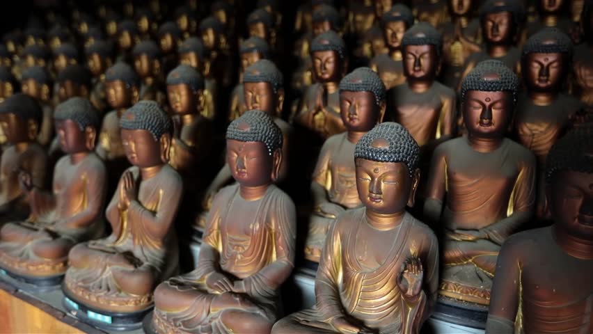 Multiple Buddha statues in Seokbulsa Mountain temple in Busan, South Korea