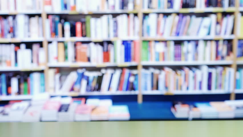 books, table and person hands leave books at library.