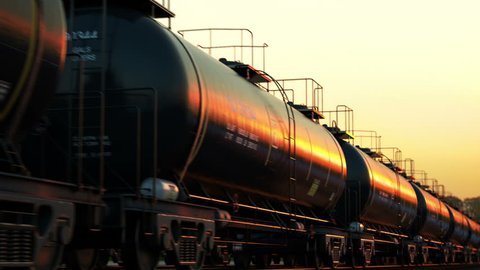 Transportation tank cars with oil during sunset. CG Animation.