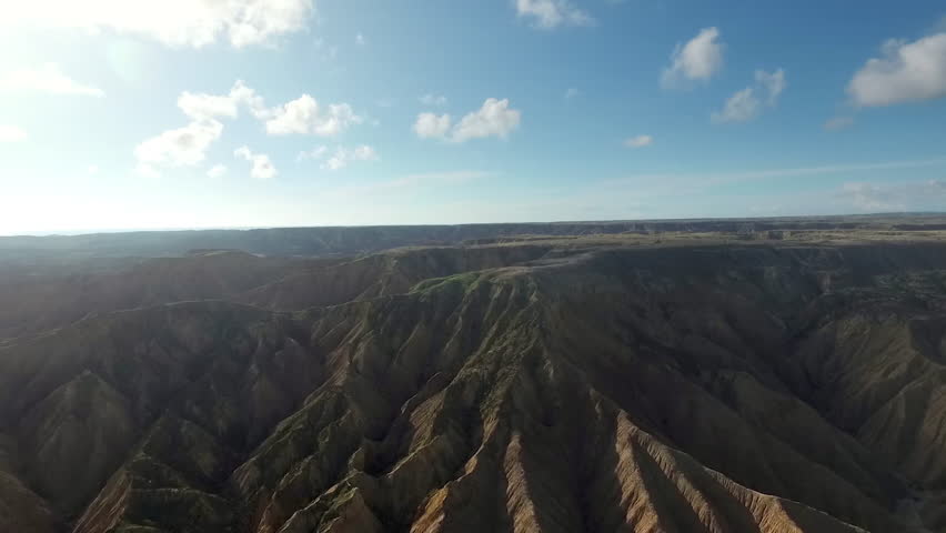 Aerial view of the Andes Mountains of Peru. Beautiful landscape of nature with high peaks touching the sky and mountain ranges.
