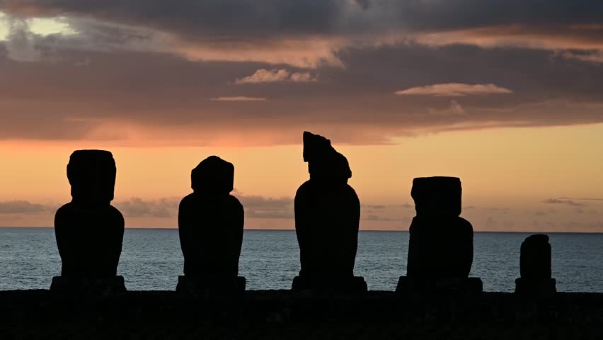 Moai at sunset. Easter Island. Rapa Nui. Platform of Tahai during september.