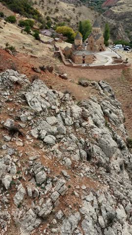 An aerial vertical footage of the 13th-century Armenian monastery of Noravank, in Vayots Dzor region, Armenia