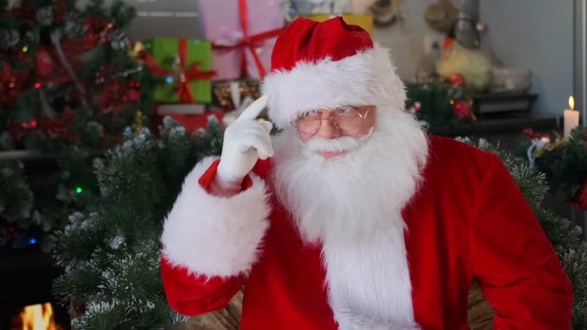 Santa raises a finger to his temple, urging everyone to focus on Christmas preparations.