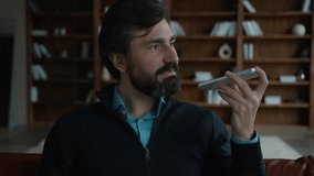 Successful serious Caucasian mature business man male businessman employer talking mobile phone saying smartphone using smart technologies dictate commands loudspeaker recording voice mail indoor room - Powered by Shutterstock - Get 15% off with code: PIKWIZARD15