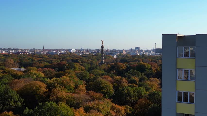 Berlin victory column colorful autumn foliage. Gorgeous aerial view flight drone