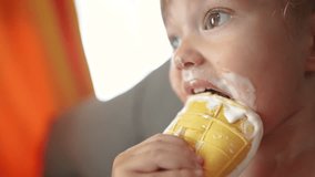 A child is eating ice cream. Icecream chocolate summer concept. lifestyle A toddler eats ice. cream. A toddler eating ice cream with a child. - Powered by Shutterstock - Get 15% off with code: PIKWIZARD15