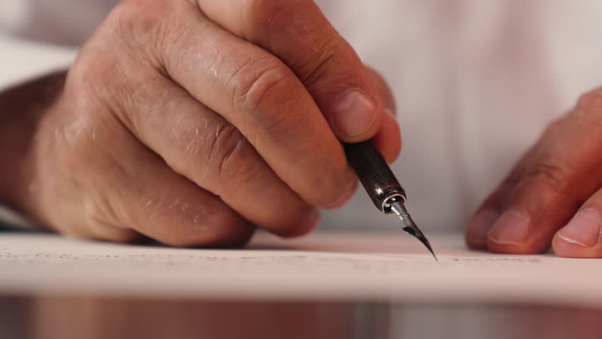 Close up old male hand holding fountain pen writer writing letter man paper business calligraphy businessman unrecognizable deal signing document paperwork signature contract vintage ink detailed text