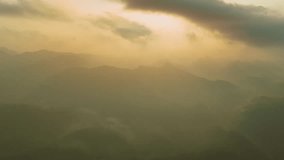 Drone aerial view Hyperlapse of landscape mountains view with fog flowing over mountains,High angle view clouds over countryside at northern Vietnam - Powered by Shutterstock - Get 15% off with code: PIKWIZARD15