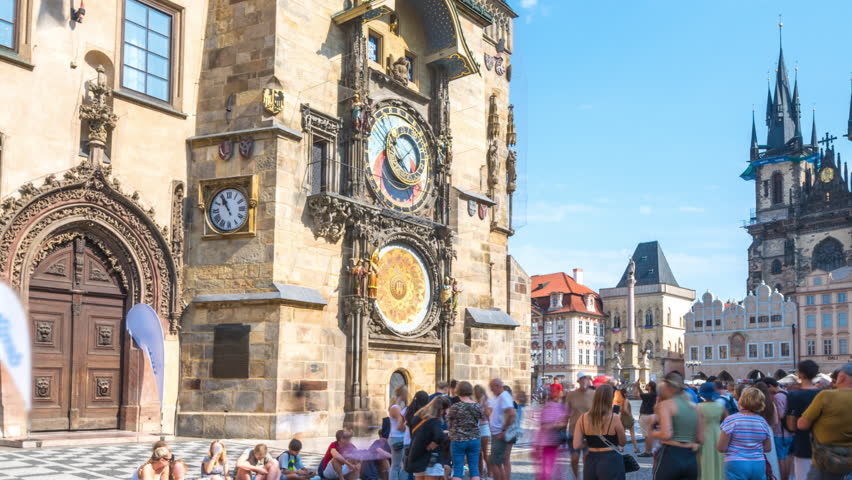 Prague Astronomical Clock timelapse hyperlapse footage, medieval astronomical clock, on the southern wall of Old Town City Hall in the Old Town Square, Prague, Czech Republic in 4K.
