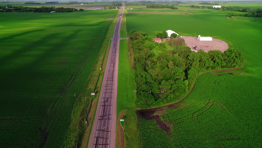 Semi trucks passing on country road in wisconsin, USA