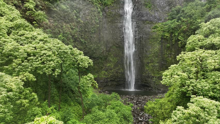 Nestled in the dense, tropical landscape of the Na Pali Coast, is this 300-foot waterfall called Hanakapi