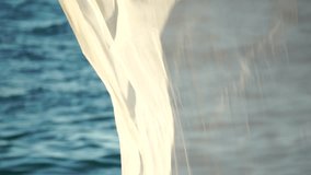 Bungalows sea sunset. Beach Lounge bed with white silky curtains. Lounge bed with canopy at seaside. Beach Chairs and Sunshades. Summer Vacation resort concept. Slow motion - Powered by Shutterstock - Get 15% off with code: PIKWIZARD15