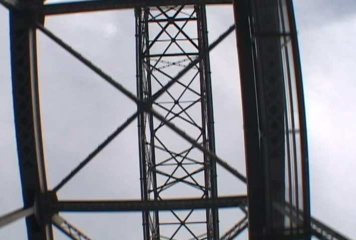 Low angle, sunroof shot looking up at Duluth, Minnesota lift bridge while