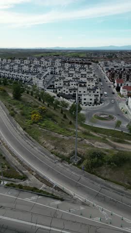 City Boundaries: Aerial View of Suburb and Toll Highway