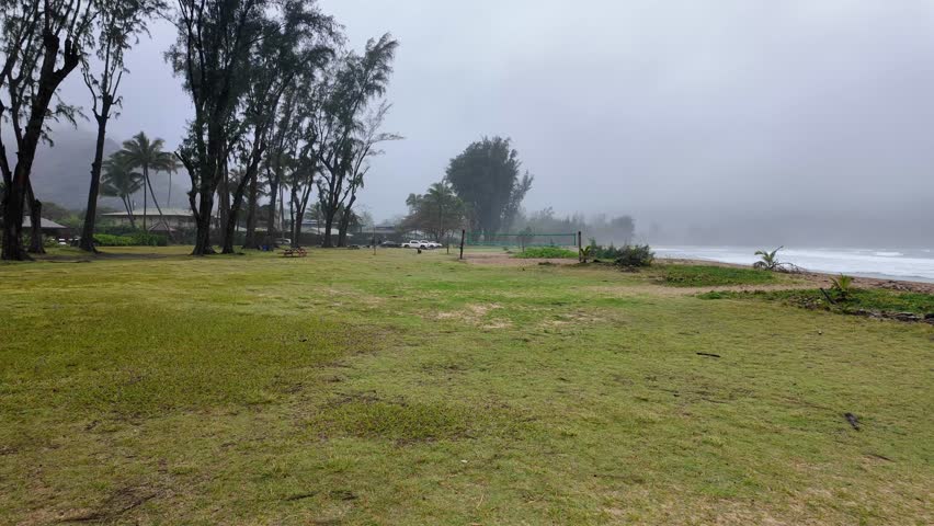 Hanalei beach on a foggy morning day. Hanalei beach in Waioli beach park on kuhio highway in Kauai Hawaii on Cloudy rainy day