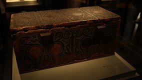 An intricately decorated antique chest with elaborate patterns and a sturdy lock, showcasing master craftsmanship from a bygone era. Ideal for adding historical ambiance. - Powered by Shutterstock - Get 15% off with code: PIKWIZARD15