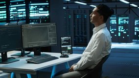 Admin in data center using augmented reality technology to ensure system can handle networking tasks. Server room worker looking at AR visualization hologram, tracking network traffic, camera A - Powered by Shutterstock - Get 15% off with code: PIKWIZARD15