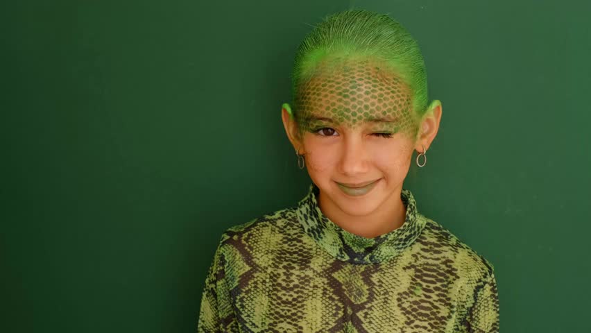 A cute beautiful teenage girl in the guise of a snake closes her eye with golden numbers 2024, a symbol of the new year