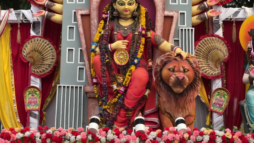 Beautiful look of Durga Idol in yellow color at Red Road for procession carnival at Red Road in Kolkata, India.