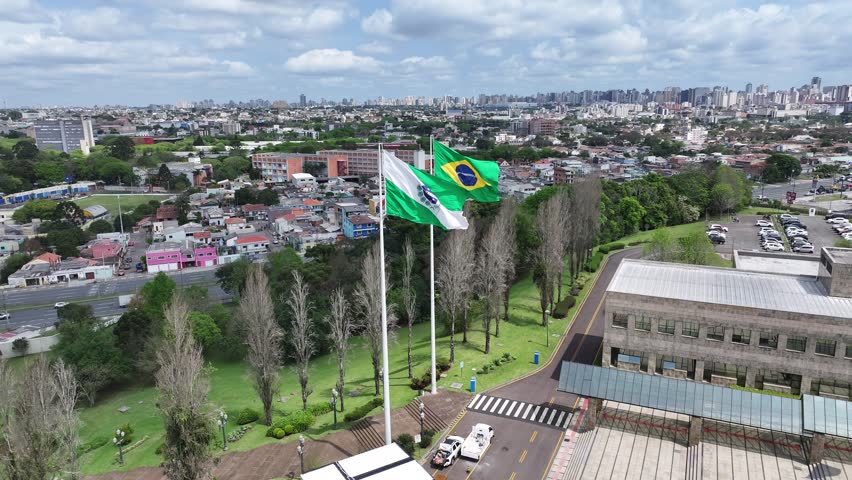 Parana And Brazil Flags At Curitiba In Parana Brazil. Brazilian Flag. Downtown City. Cityscape Background. Parana And Brazil Flags At Curitiba In Parana Brazil.