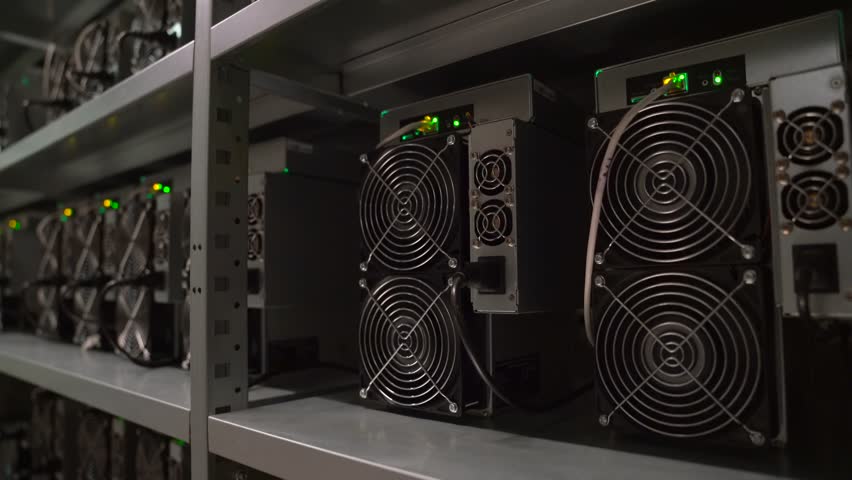 Data center with computers in a server room for cryptocurrency mining - Powered by Shutterstock - Get 15% off with code: PIKWIZARD15