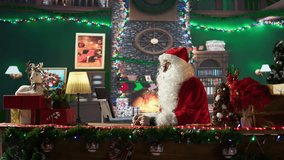 Saint Nicholas chatting on web video call with parents and kids, using a tablet at the North Pole before making preparations for his Christmas holiday journey. Magical character. Camera B. - Powered by Shutterstock - Get 15% off with code: PIKWIZARD15