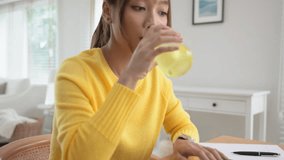 Happy fresh asia people young adult woman take skin care detox pill folic iron drinking diet zinc vit c d boost water for worker enjoy relax work at home desk. Herbal juice glass refresh immune system - Powered by Shutterstock - Get 15% off with code: PIKWIZARD15