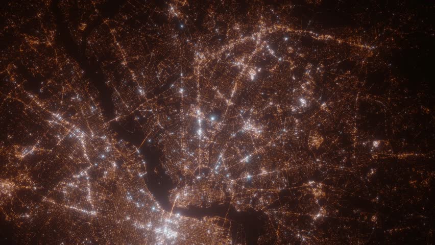 Cherry Hill (New Jersey, USA) top view at night. Top view on modern city with street lights and glow effect. Camera is zooming in, rotating clockwise. Vertical video. The north is on the left side