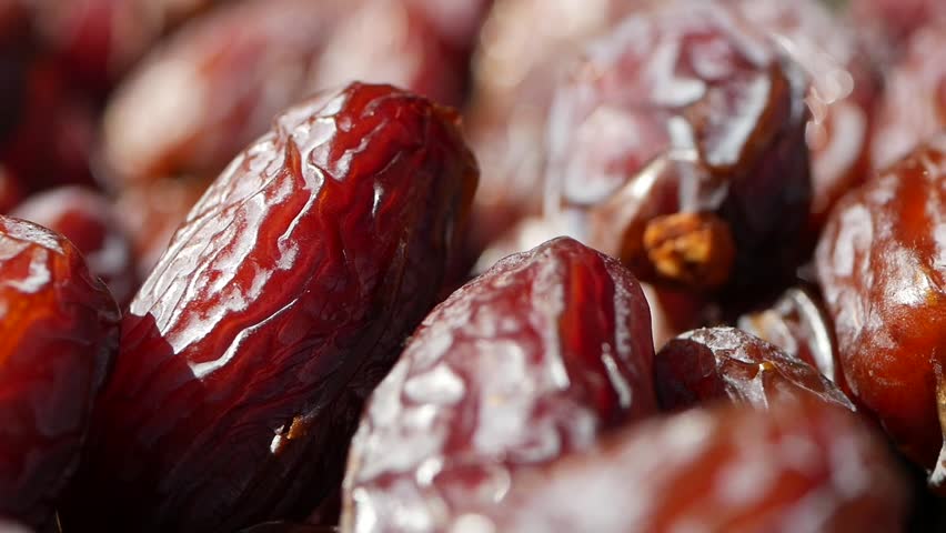 A CloseUp View of Juicy and Delicious Dried Dates Beautifully Arranged on Display