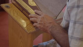 muslim man hand holding Holy book Quran at mosque  - Powered by Shutterstock - Get 15% off with code: PIKWIZARD15