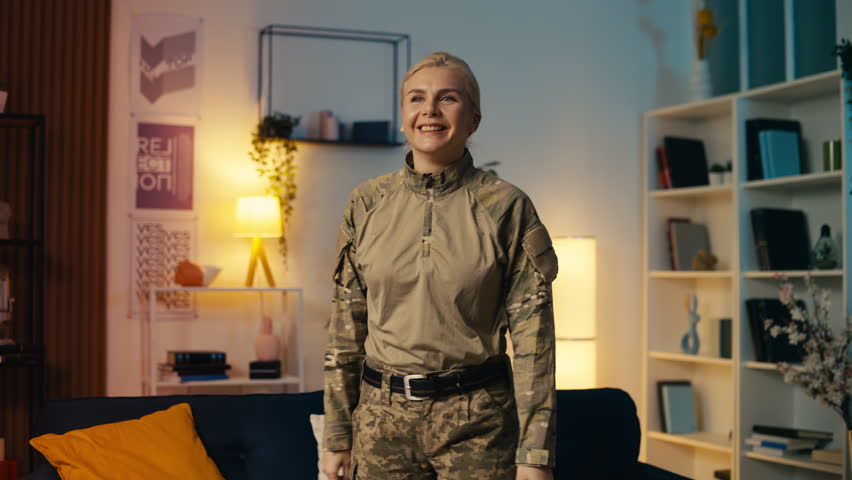 Glad military mom coming back home, hugging daughter with Israeli flag, reunion