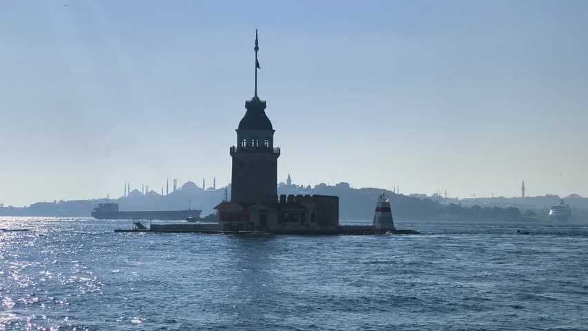 Maiden's Tower stands sentinel on the Bosphorus.The historic Maiden's Tower, also known as Leander's Tower, is seen here on a sunny day in the Bosphorus strait, Istanbul, Turkey. 4k fullhd video 