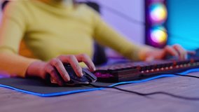Excited Female Gamer Celebrating Victory in Colorful Gaming Setup. Young Woman with Headset Immersed in Online Game. Vibrant LED Lighting and Powerful PC Create Dynamic Esports Environment. - Powered by Shutterstock - Get 15% off with code: PIKWIZARD15