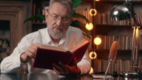 Old Caucasian man male pensioner elderly read book hobby leisure office successful home library reader turn page literary businessman business brainstorming bookshelf bookworm poetry textbook indoor - Powered by Shutterstock - Get 15% off with code: PIKWIZARD15