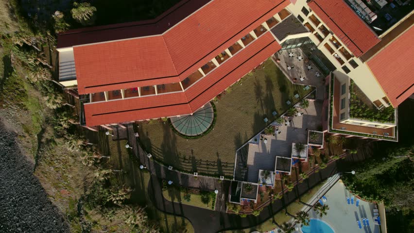 Drone view of the hotel located on the cliff on the shore of the Atlantic ocean