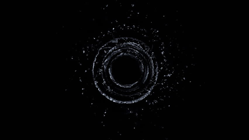 Super Slow Motion Shot of Rotating Water Splash Isolated on Black Background at 1000fps.
