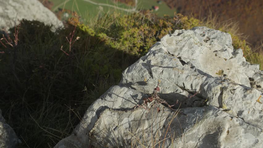 View from the top of the mountain to the autumn valley below.