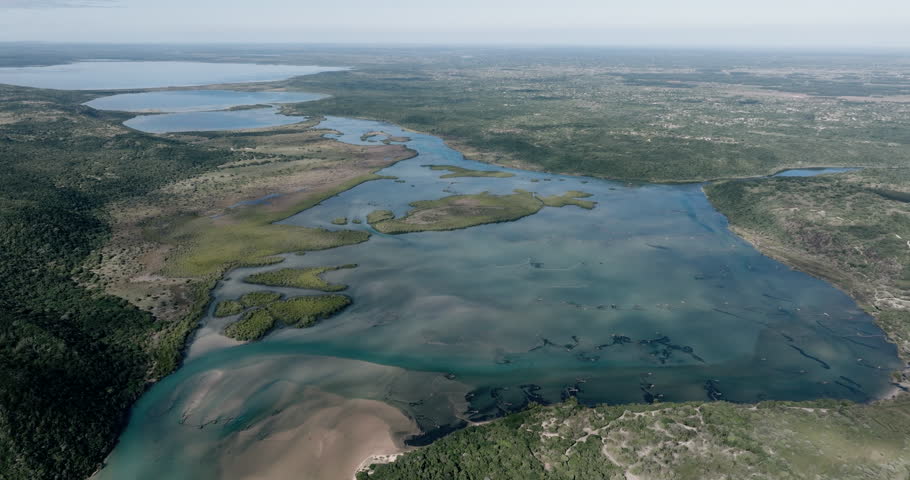 Aerial zoom out view of the beautiful Kosi Bay Estuary and lakes with its fish ancient woven traps in the Maputaland area of KwaZulu-Natal