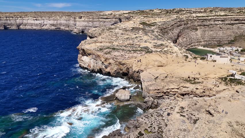 Aerial view of Azure Window remains in Dwerja Bay, Gozo, Malta