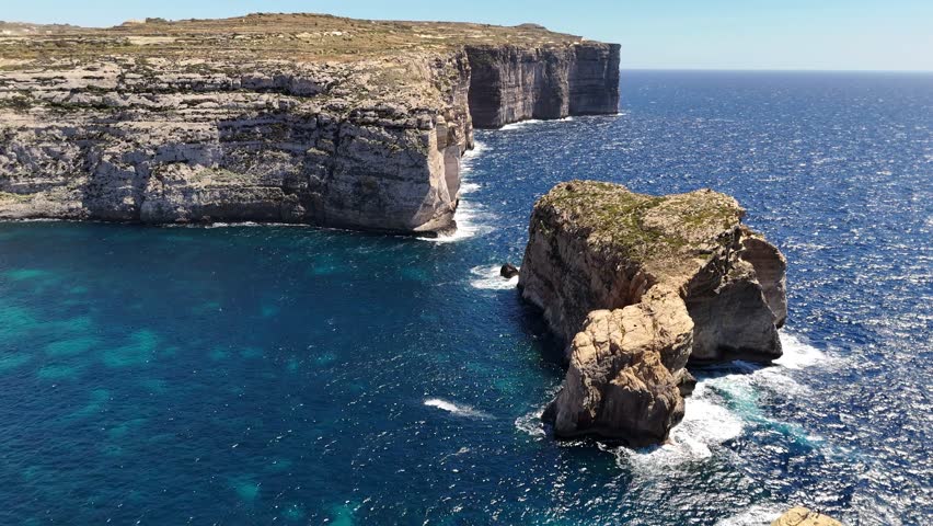 Bird's-eye view of Fungus Rock and Dwerja Bay, Gozo Island, Malta